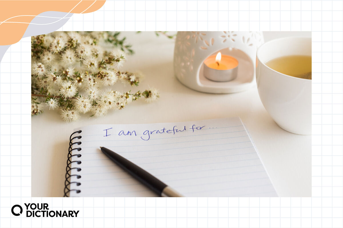 notebook with the words "I am grateful for ..."