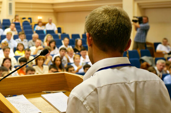 male student giving a speech